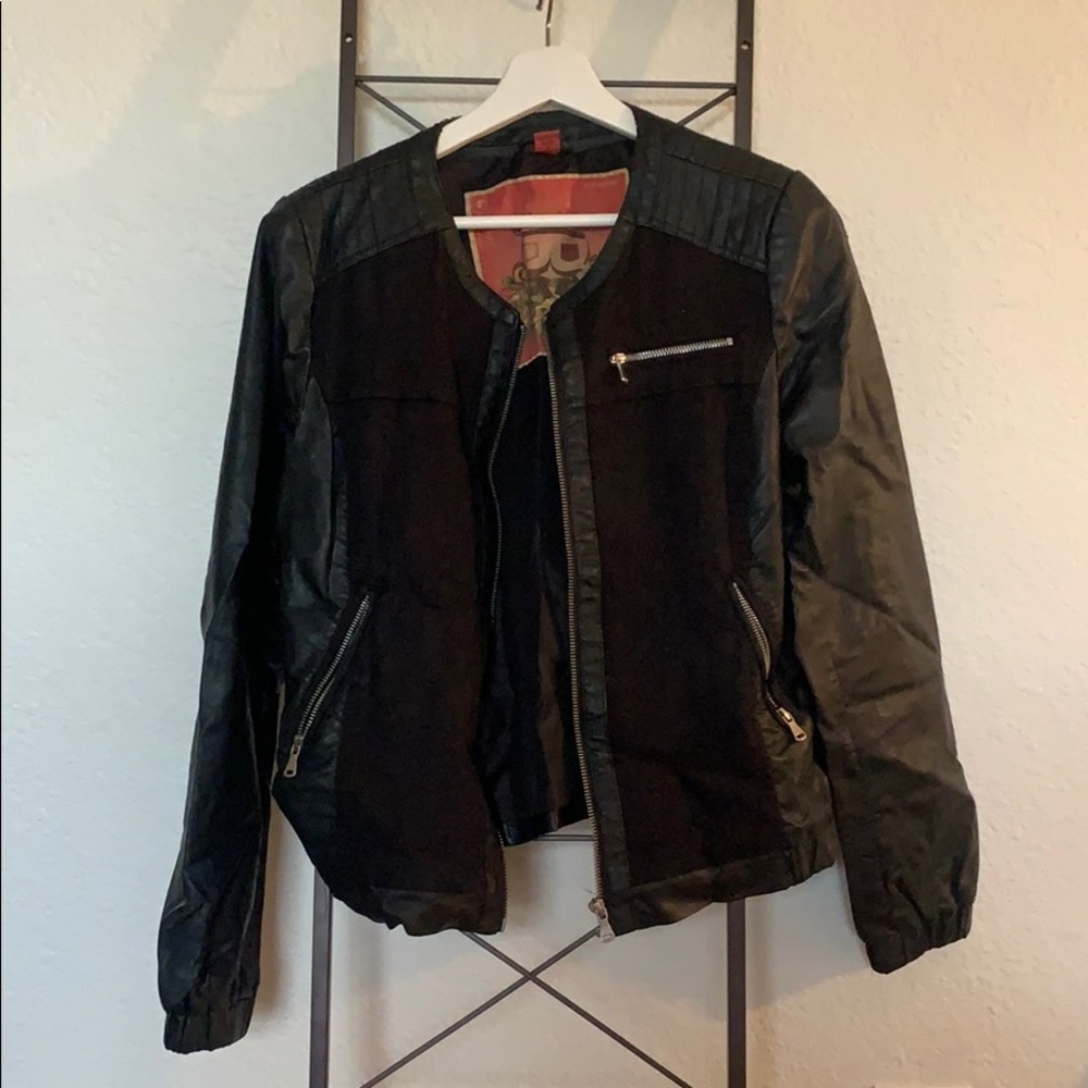 Leather jacket with black paneling